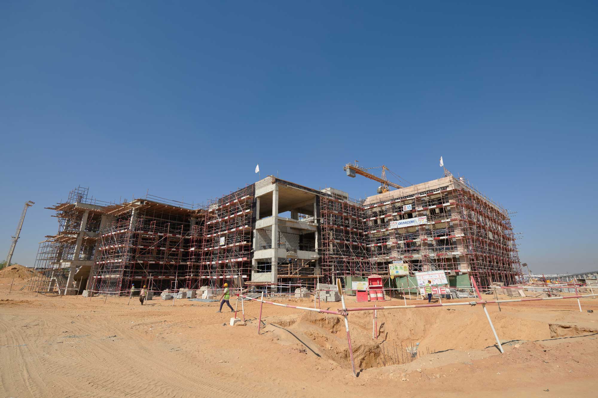 A different, rectangular building under construction