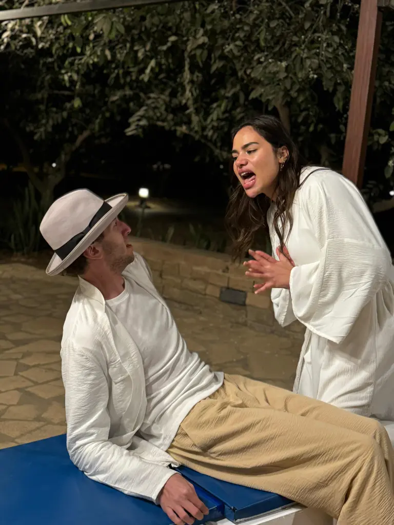 people fighting in the AUC garden in a scene from one of the plays