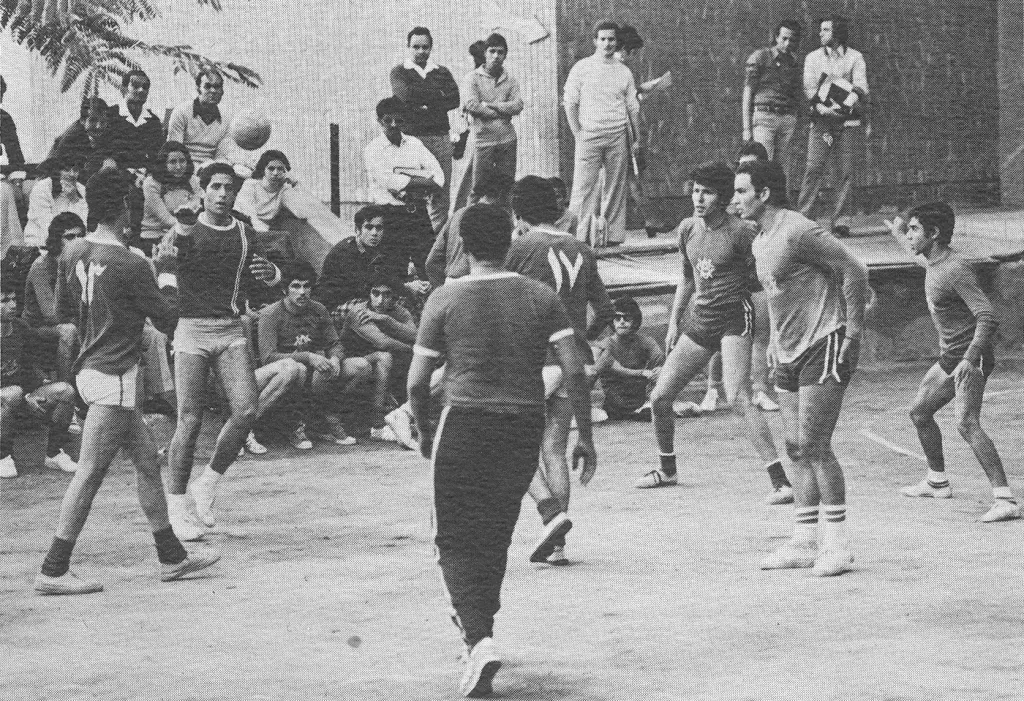 group of men playing football 